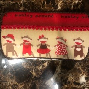 Sock monkey wipe holder